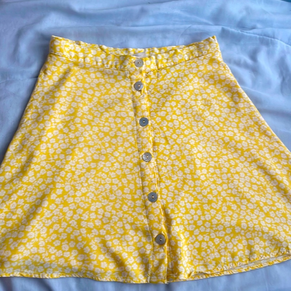 YELLOW FLOWER PRINT SKIRT with buttons down the middle